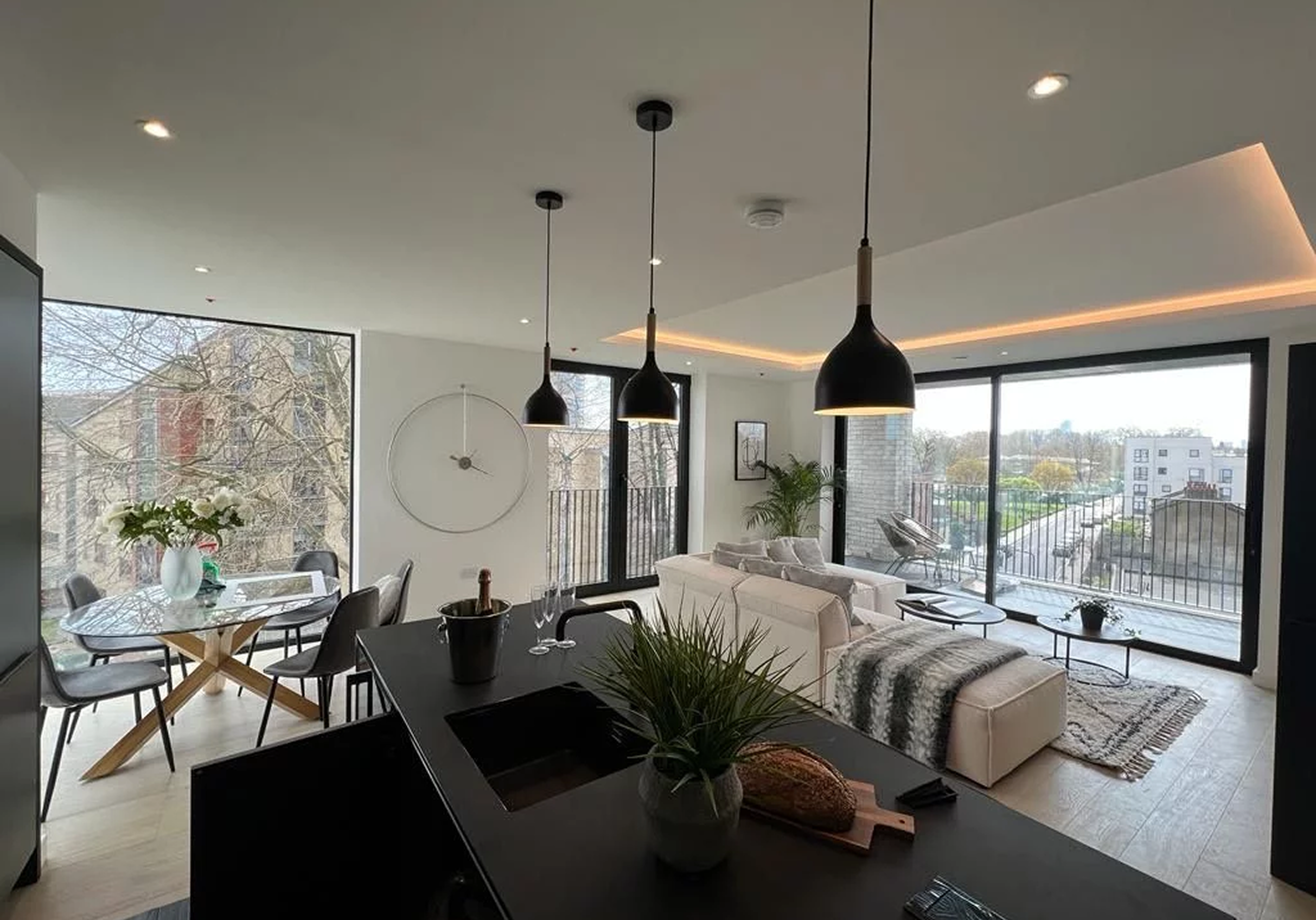 Open-plan apartment at Lucent House, London, with floor-to-ceiling commercial glazing